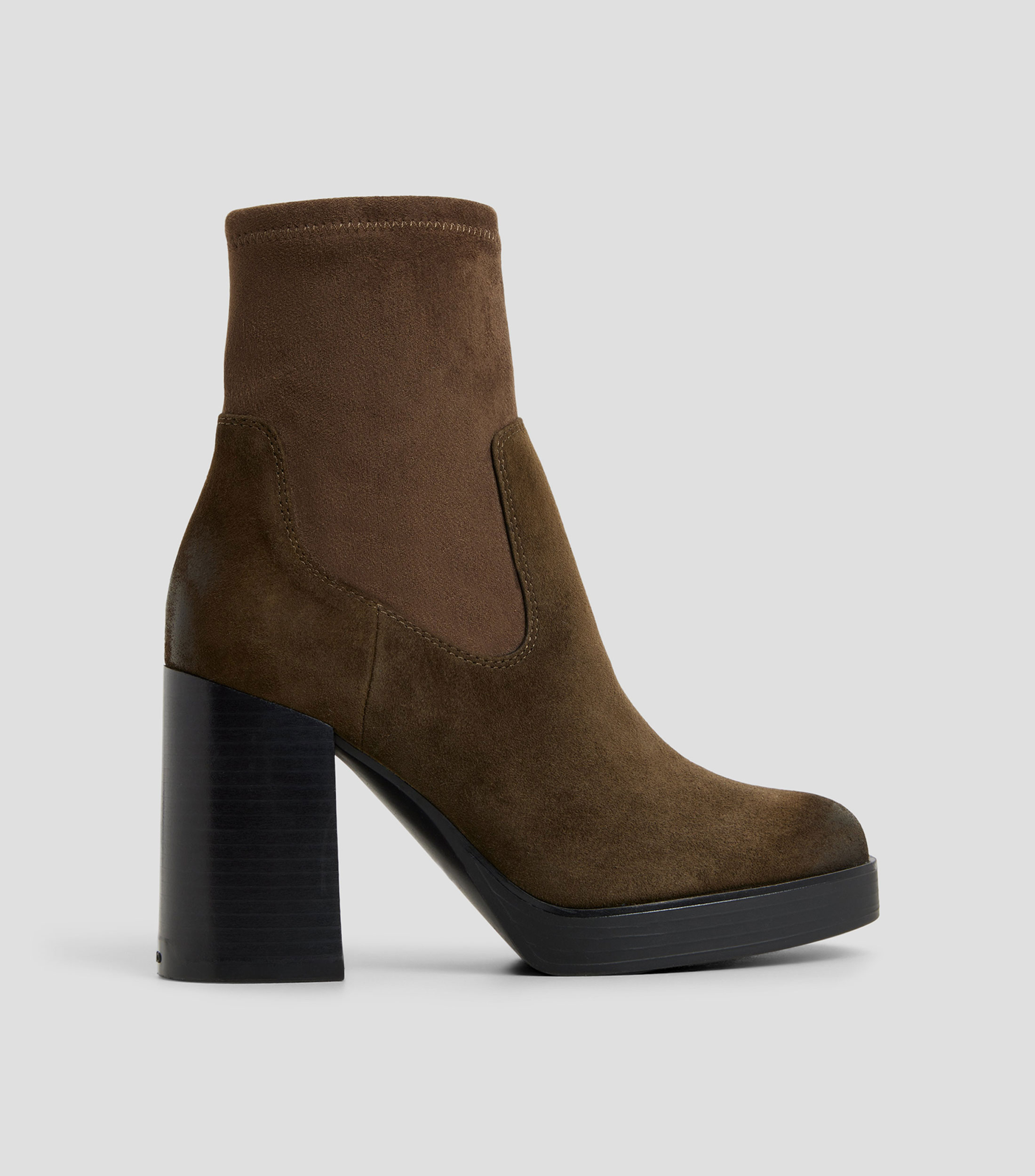 Botines en piel de tacón alto de media luna Mujer